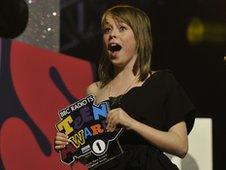 Chelsea, 15, collecting her award