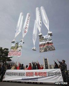 Activists launch balloons carrying leaflets at Imjingak pavilion in Paju, north of Seoul in this 15 April, 2012 file photo