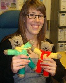 Knitted bears being presented to hospitals by West Mercia Police