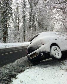 A car affected by snow on the B4070 in Gloucester