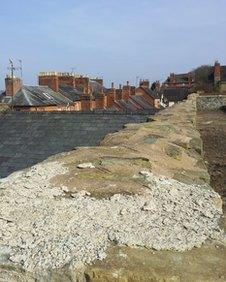 Houses built close to Ludlow town walls