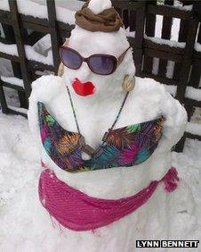 A snow woman in New Mills, Powys