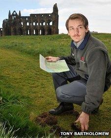 Josh Turner, English Heritage steward, at the site of Whitby Abbey