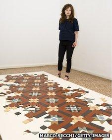 Corin Sworn in front of 'Untitled' 2013 at Palazzo Pisani (S.Marina)