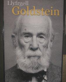 A poster of Leonard Goldstein in the university's new reference library