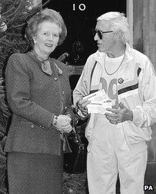 Margaret Thatcher and Jimmy Savile outside Downing Street in 1988