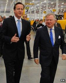 David Cameron and Sir Anthony Bamford visiting a JCB factory in Brazil in 2012