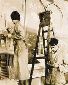 Eric Ravilious and wife Tirzah working on the mural