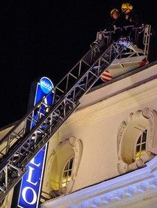 Members of the emergency services at London's Apollo theatre