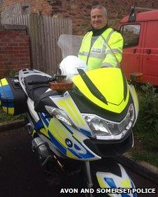 Policeman with bike