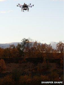 Drone flying over trees