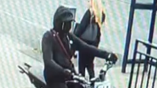 CCTV image of hooded young person on e-bikes