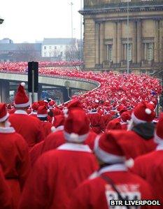 Loads of Santa runners snake up city centre