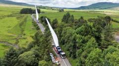 Giant turbine convoy makes its way to wind farm