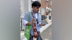 He reads, buys flowers and plays the ukulele. A dream man or is it all a performance?