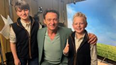 Hugh Jackman with brothers William and Jack.