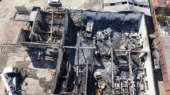 Drone footage reveals full extent of garage fire destruction