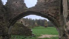 Footbridge planned to keep ruined priory open