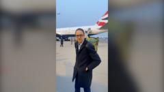 Chris Mason reports from the tarmac in Beijing