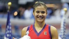 Great Britain"s Emma Raducanu holds the trphy as she celebrates winning the women"s singles final on day twelve of the US Open