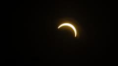 In pictures: Sky watchers gather for solar eclipse