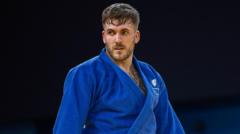 Powell wins judo silver after 'going through hell'