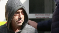 Man charged with murder after body found in fishing town