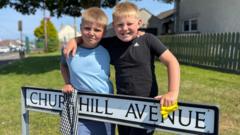 Brothers use summer holiday to bring a shine to street signs