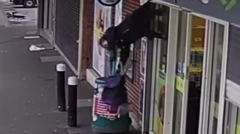Woman hoisted into thin air by shop shutters in viral moment dies