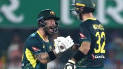 Maxwell's record-equalling ton leads Australia to victory