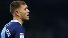 Wycombe's Mawson, 29, retires because of injury