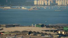 Two dead after cargo plane skids off Hong Kong runway into sea