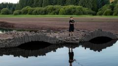 200-year-old bridge hidden for a century seen again after drought