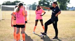 Football coach 'breaking barriers' in the sport