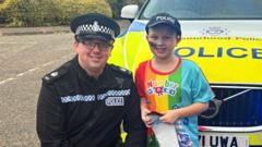 Boy with cancer delighted by surprise police visit