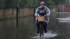 Flash floods and heavy rain batter England and Wales