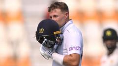 'Many more runs to get', says record-breaker Root