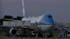 Trump hidden in catering truck in secret plane swap over Iran threat, reports say