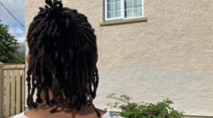 Nigerian woman buoyed by kindness of neighbours after racist attack