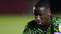 Defender Olowu signs new Doncaster deal