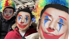 Fans' clown protest against football club owner