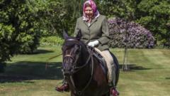 The Queen rides in the grounds of Windsor castle