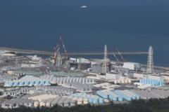 Japan's Fukushima plant workers evacuate after tsunami warning