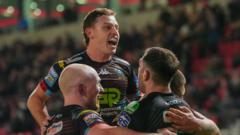 Wigan leave it late to beat Salford and stay top