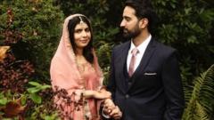 Malala Yousafzai and Asser Malik