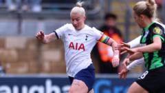 England scores late as Spurs draw with Brighton