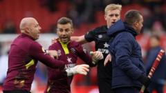 Brentford coach & Forest groundsman charged by FA