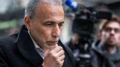 Swiss Islamic scholar Tariq Ramadan arrives for the second day of his trial at the Geneva court, 16 May 2023