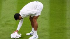 Djokovic wins after farcical rain delay scenes