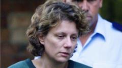 Kathleen Folbigg leaving Maitland Court after being refused bail on 22 March 2004